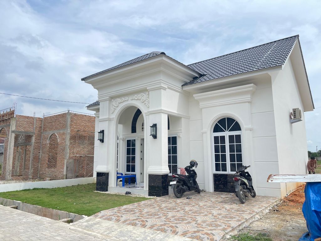foto tampak rumah tipe 82 perumahan HARMONI REGENCY