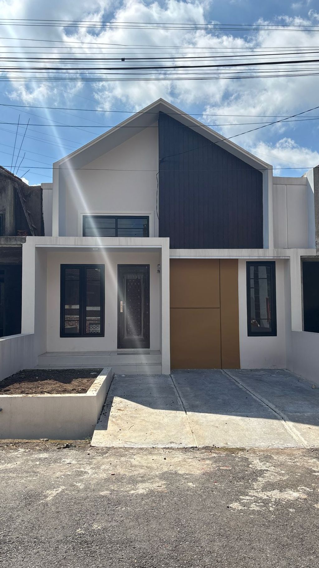 foto tampak rumah tipe 38/72 perumahan GRAND MUTIARA TASIK REGENCY
