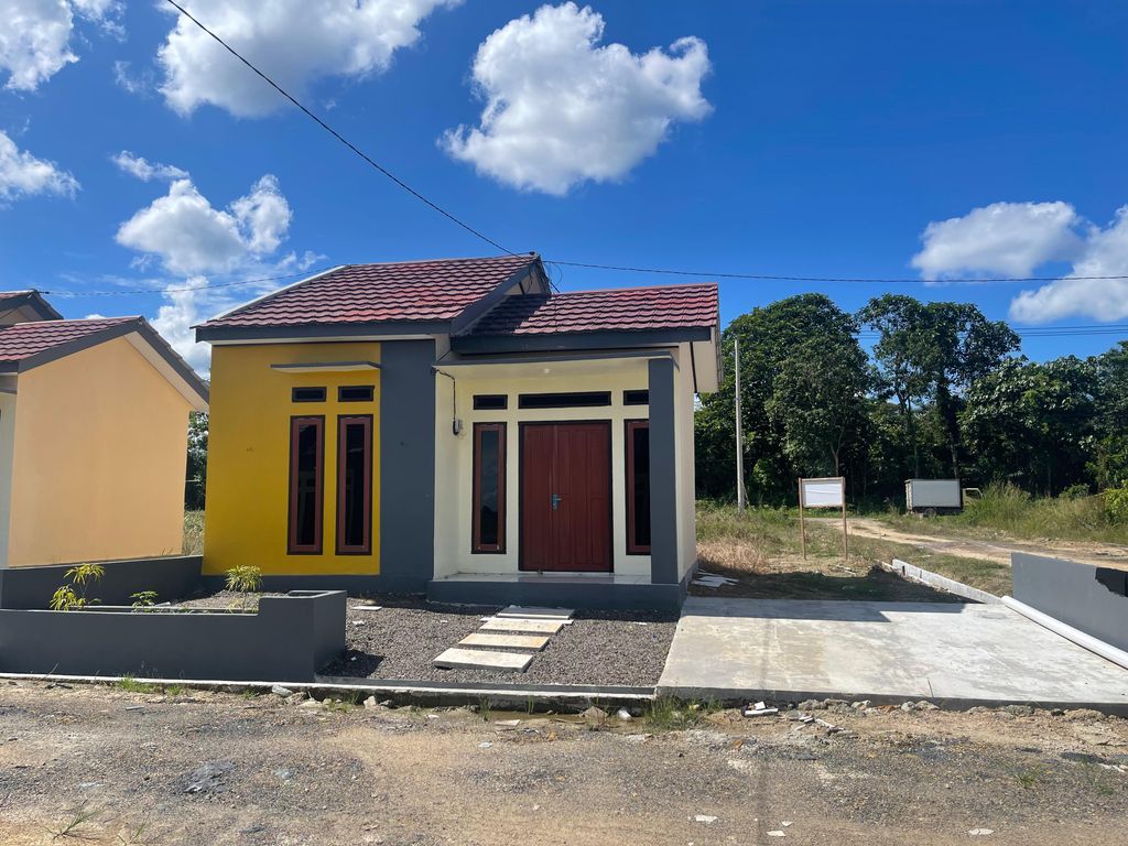 foto tampak rumah tipe 36 perumahan Duta Graha Residence