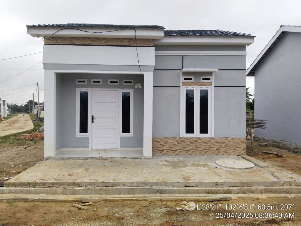 foto tampak rumah tipe RST perumahan GRAHA NUSA INDAH 2