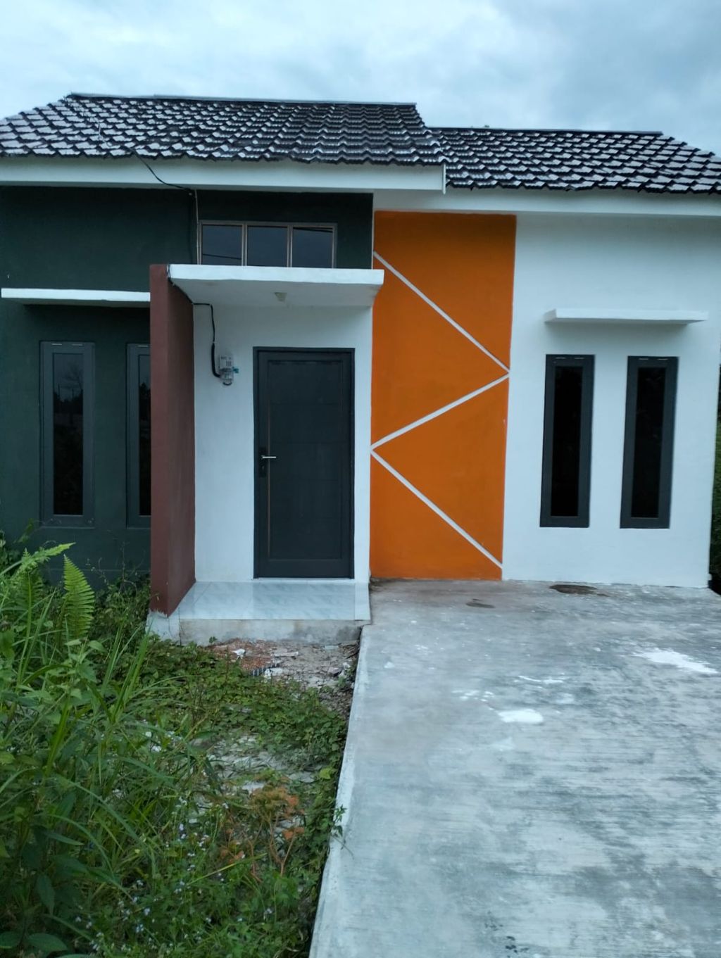 foto tampak rumah tipe 36 perumahan Bambu Mas Indah 2