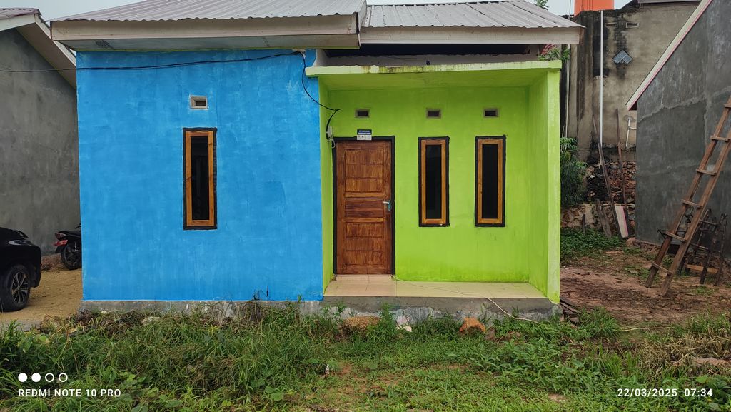 foto tampak rumah tipe 36 m3 perumahan DELHAN RESIDENCE