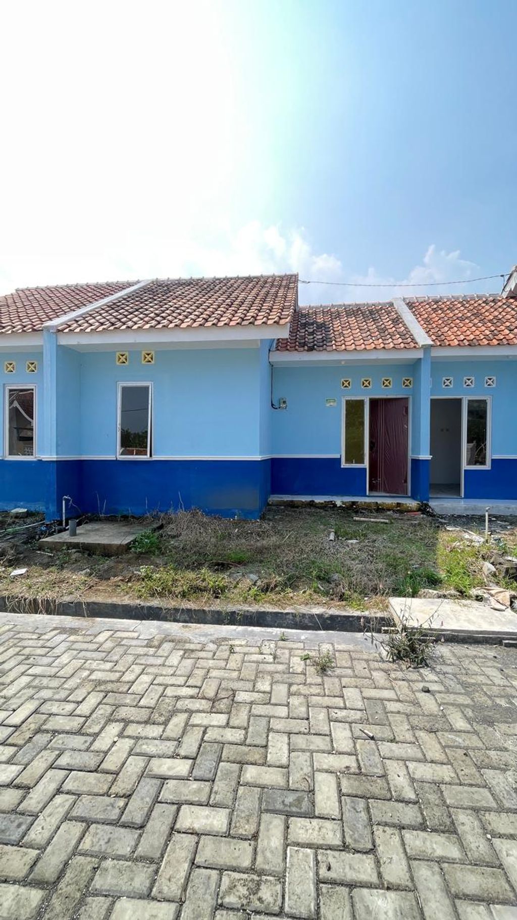 foto tampak rumah tipe Blok E No 23 perumahan GRAND MAHKOTA SULTAN 4