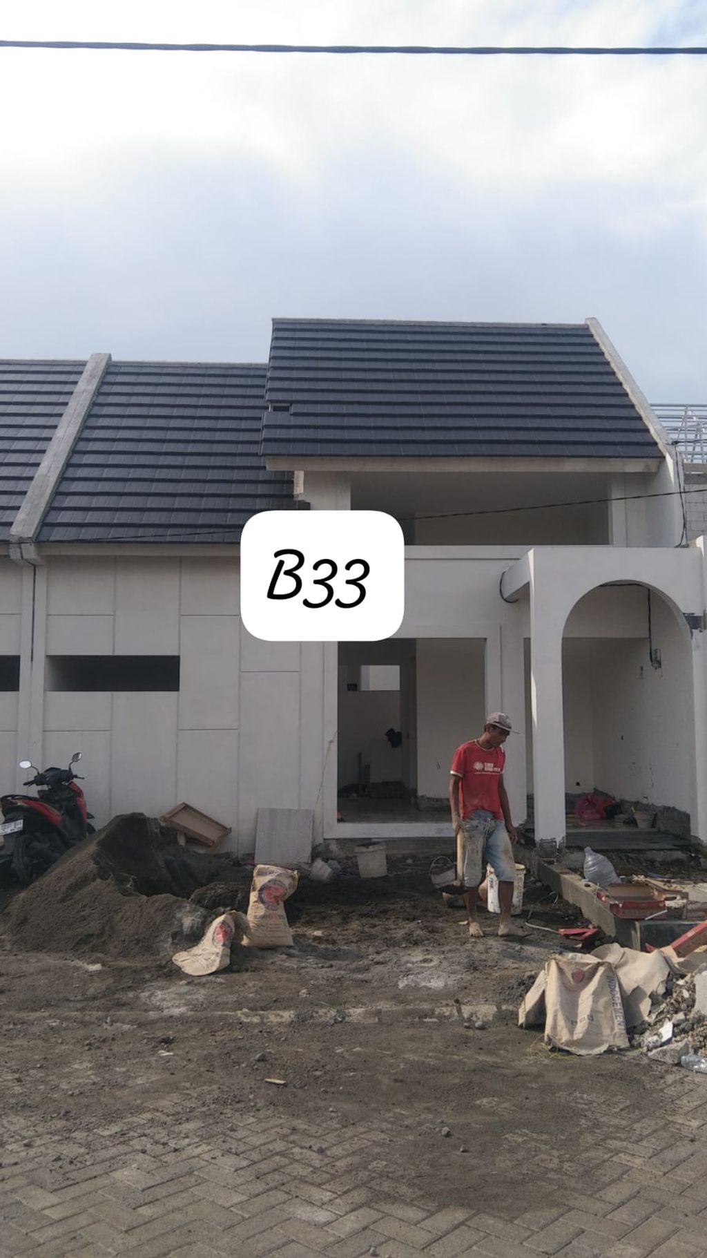 foto tampak rumah tipe Blok B-33 Galan Cluster Kensington perumahan The Anvaya Juanda