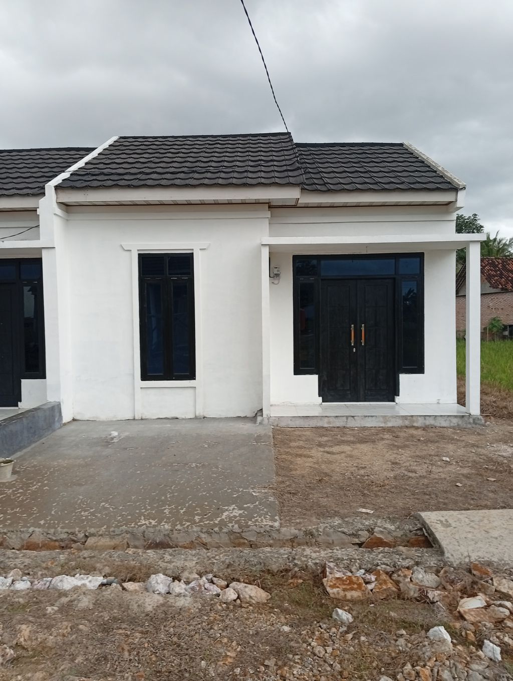 foto contoh rumah perumahan PERUMAHAN ARJUNA 88