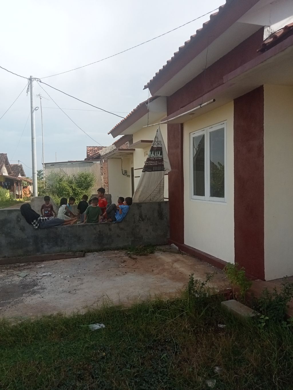 foto gerbang perumahan SAHILNA GRIYATAMA Cluster