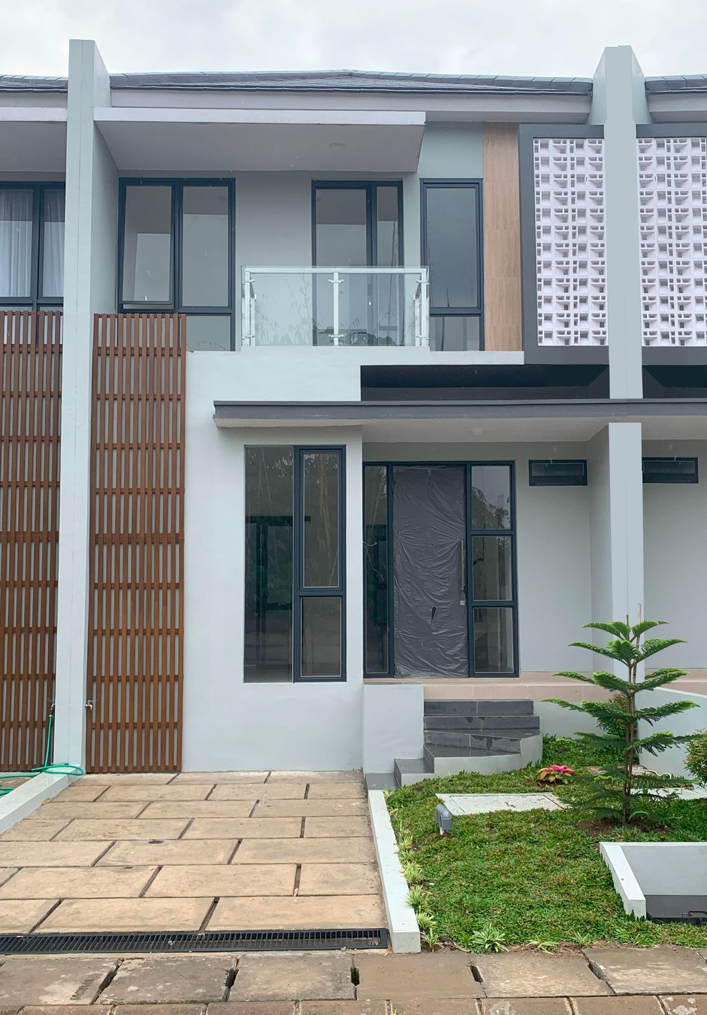 foto tampak rumah tipe JASMINE-D-15 perumahan Penta Garden