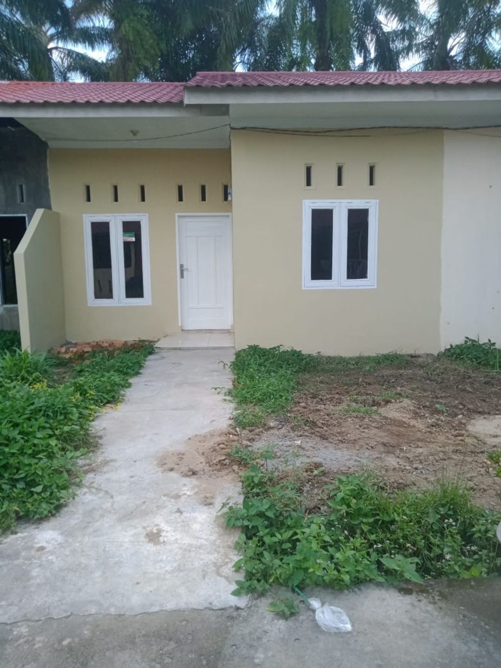 foto tampak rumah tipe 24 perumahan RUMAH SEJAHTERA KINIBALU,