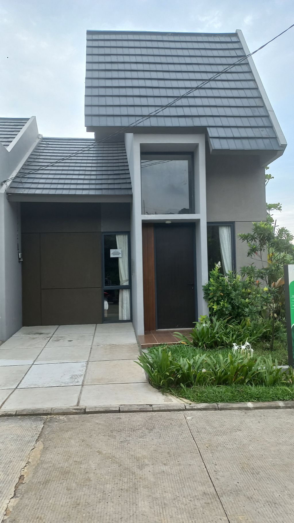 foto tampak rumah tipe BRISIA perumahan PUTA NUTU RESORT & RESIDENCE