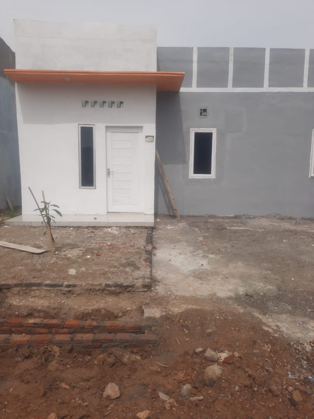 foto contoh rumah perumahan Perumahan Taman Hijau
