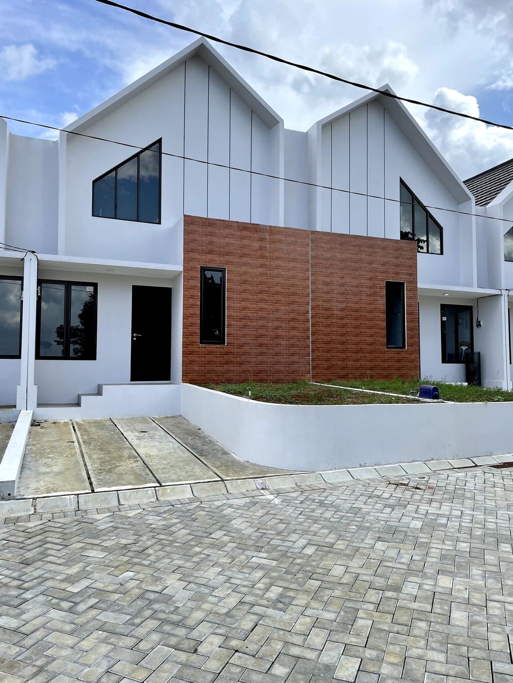 foto tampak rumah tipe T.38/125 perumahan Heliconia Garden