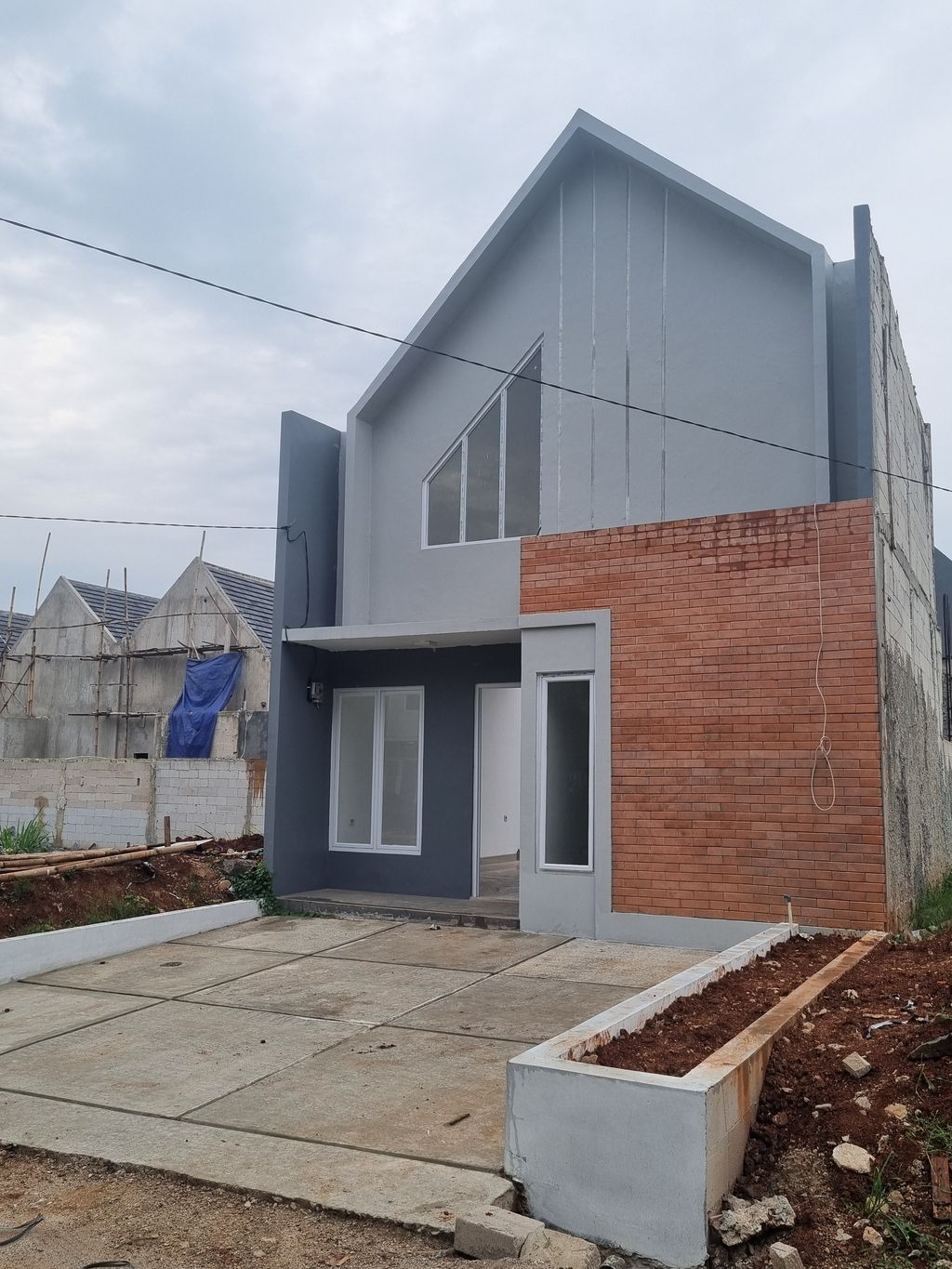 foto tampak rumah tipe T.36/100 perumahan CINERE RESIDENCE
