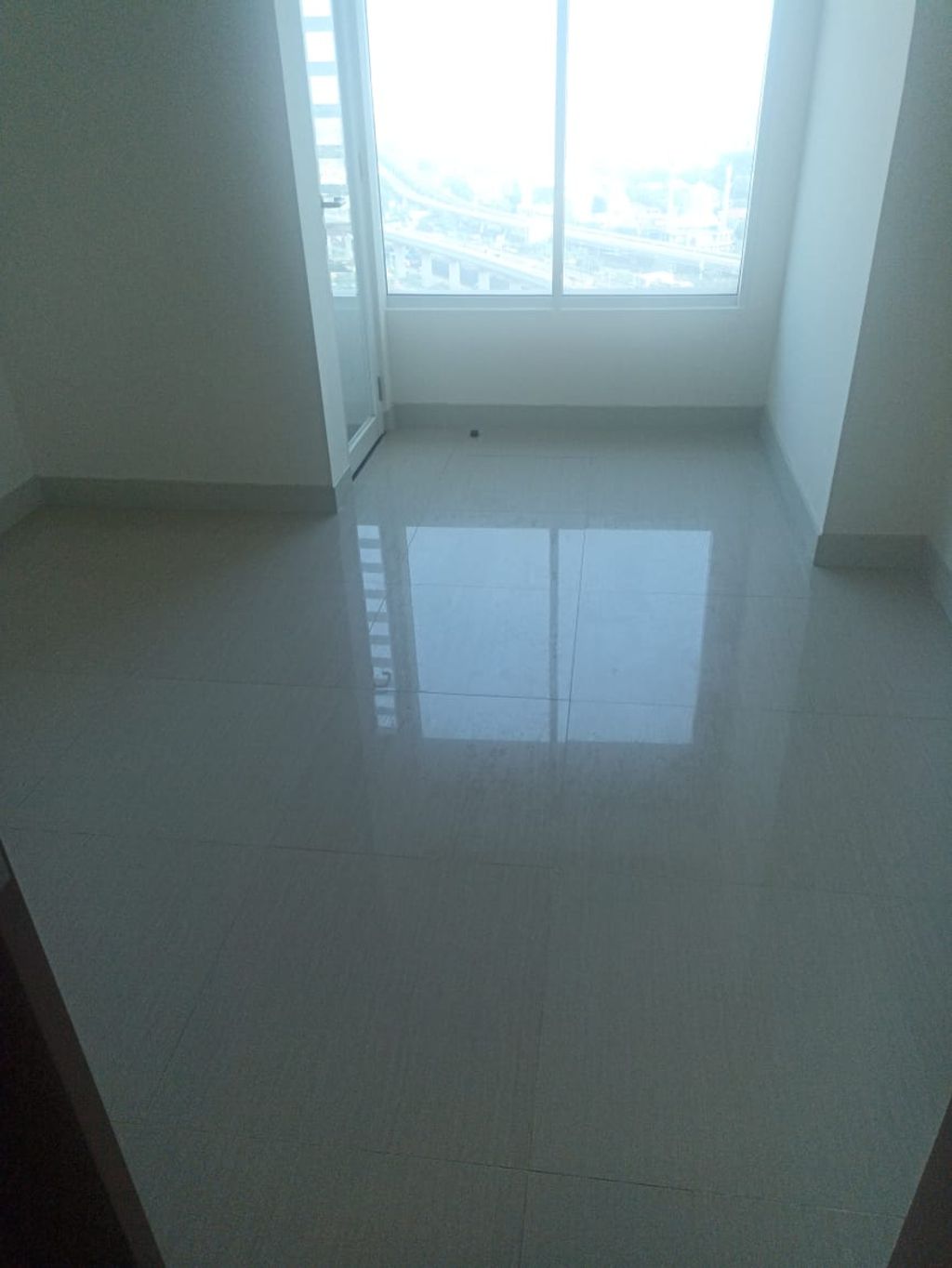 foto tampak rumah tipe BARCLAY NORTH 1 BR J perumahan GRAND KAMALA LAGOON TOWER EMERALD & BARCLAY