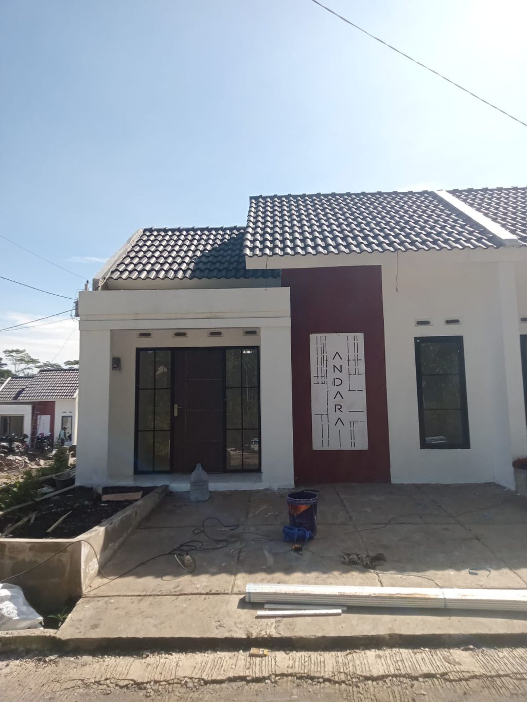 foto tampak rumah tipe SUBSIDI 01 perumahan ANDARA BLOSSOM VILLE