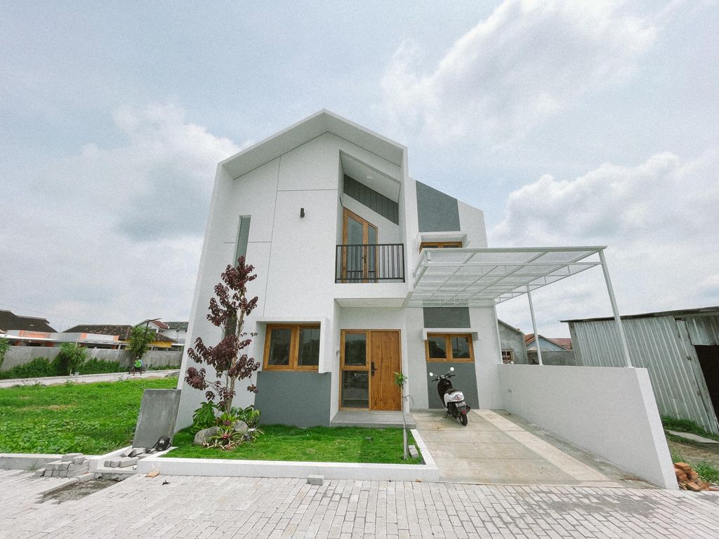 foto tampak rumah tipe 83/90 perumahan TAMAN HARMONI TRIYAGAN