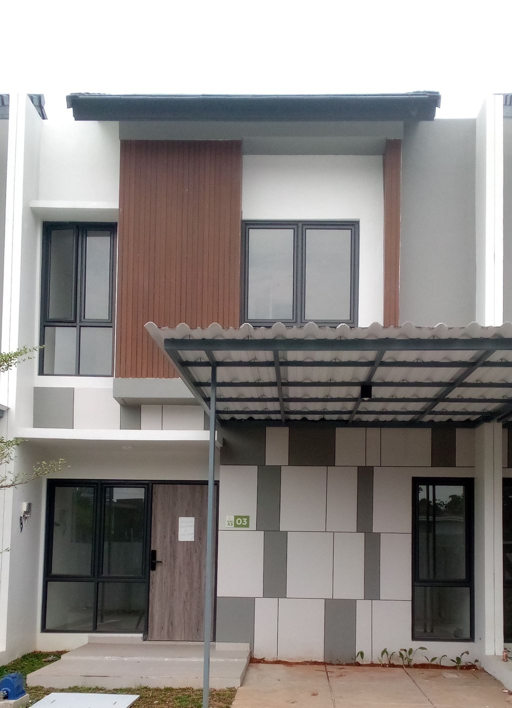 foto tampak rumah tipe SAPPHIRE BLOK A3 NO. 03 perumahan GRAND ALMAS RESIDENCE