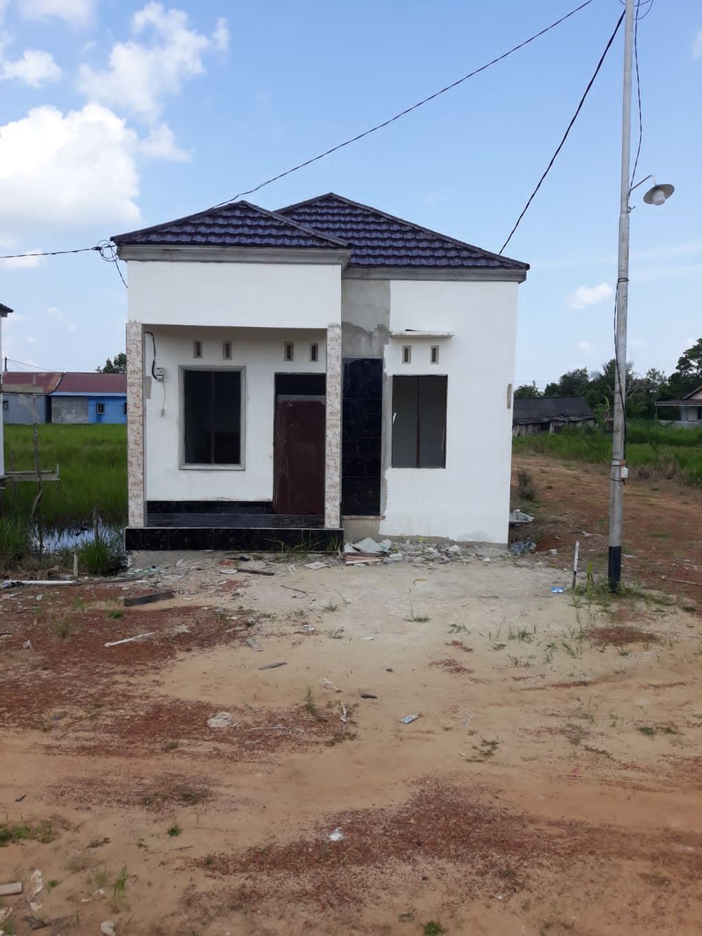 foto tampak rumah tipe 36 perumahan RANIA RESIDENCE