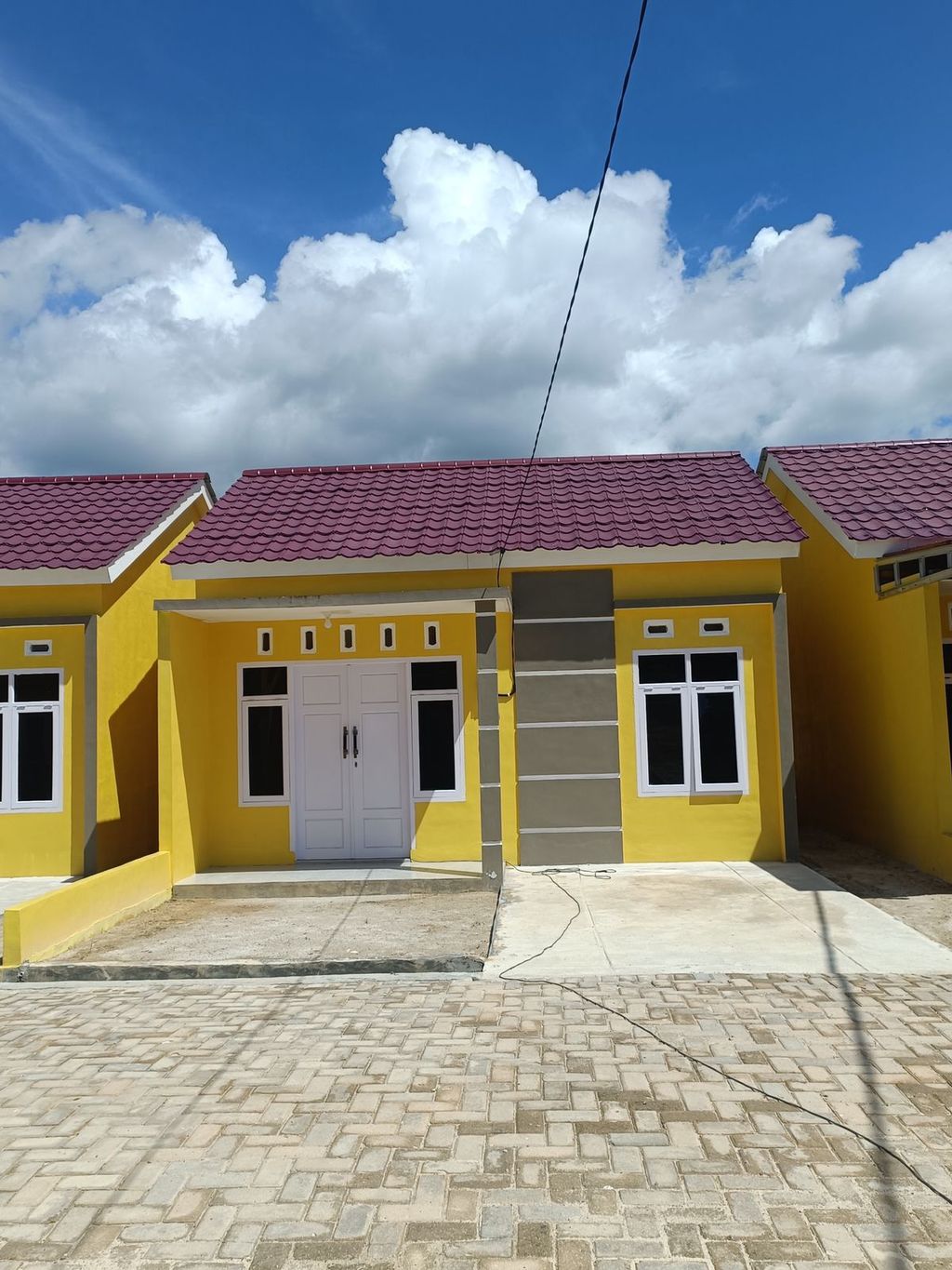 foto tampak rumah tipe 36/84 perumahan anjaya residence