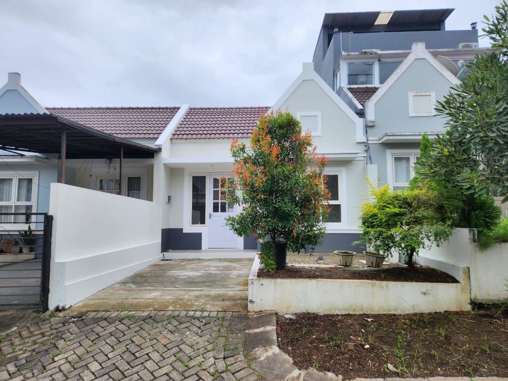 foto tampak rumah tipe GRASSEN DELUXE perumahan CITRALAND MANADO