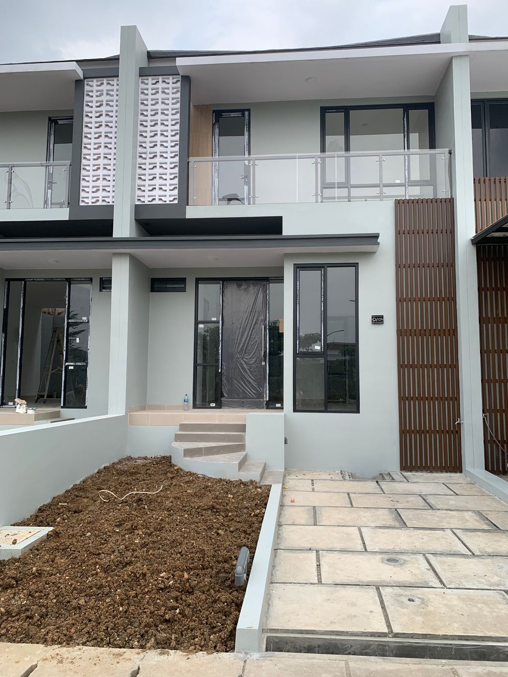 foto tampak rumah tipe JASMINE-D-16 perumahan Penta Garden