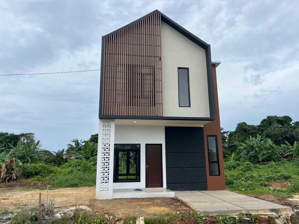 foto tampak rumah tipe CALYA perumahan BUANA AMERTA REGENCY