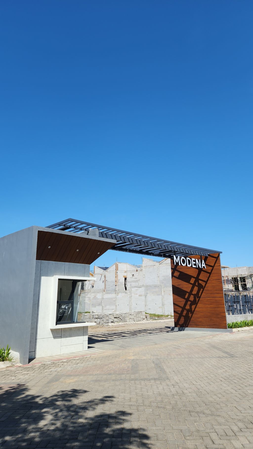 foto gerbang perumahan Mutiara City Cluster Modena
