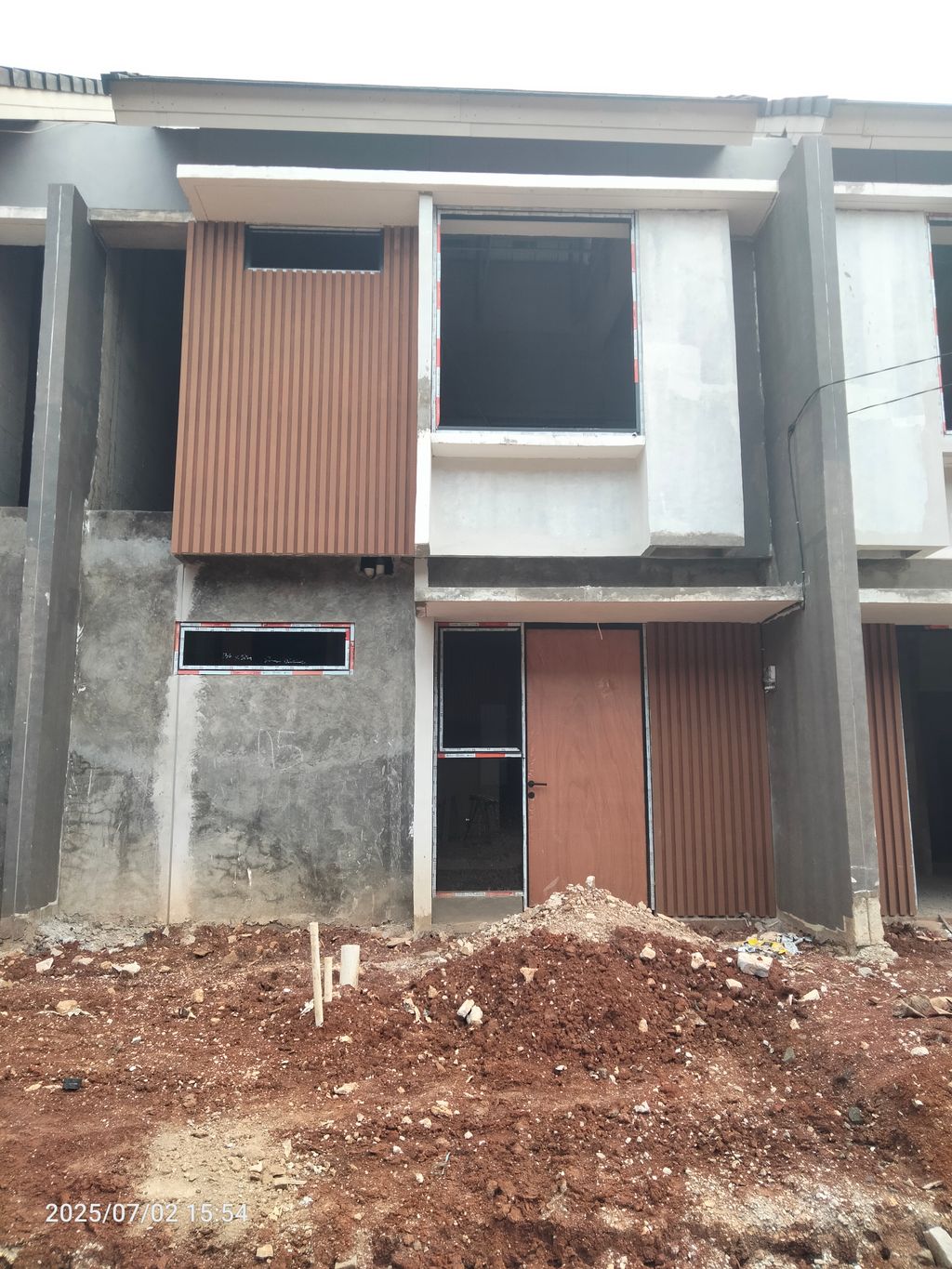 foto tampak rumah tipe 60/60 ( Momo ) perumahan Mustika Garden Tamansari
