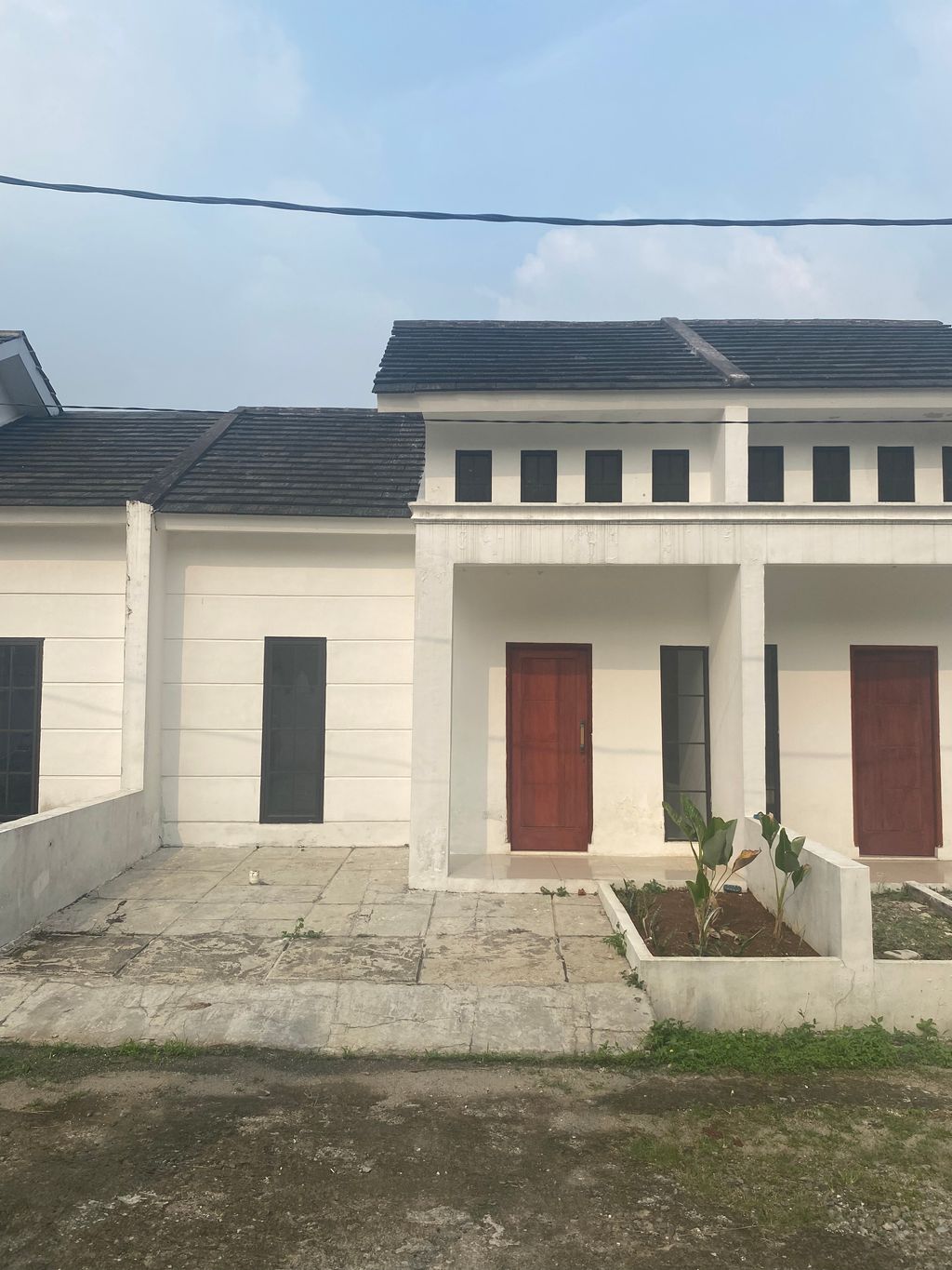 foto tampak rumah tipe 36/66 perumahan ADEN RESIDENCE