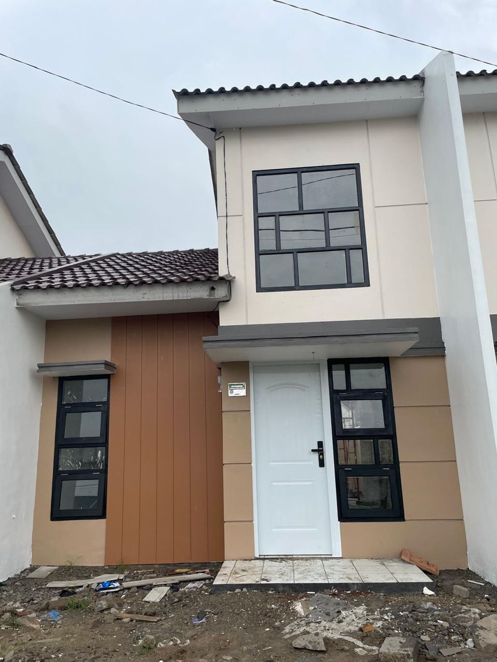 foto tampak rumah tipe Subsidi perumahan GRAND HARMONI 3 JAYANTI TAHAP 3