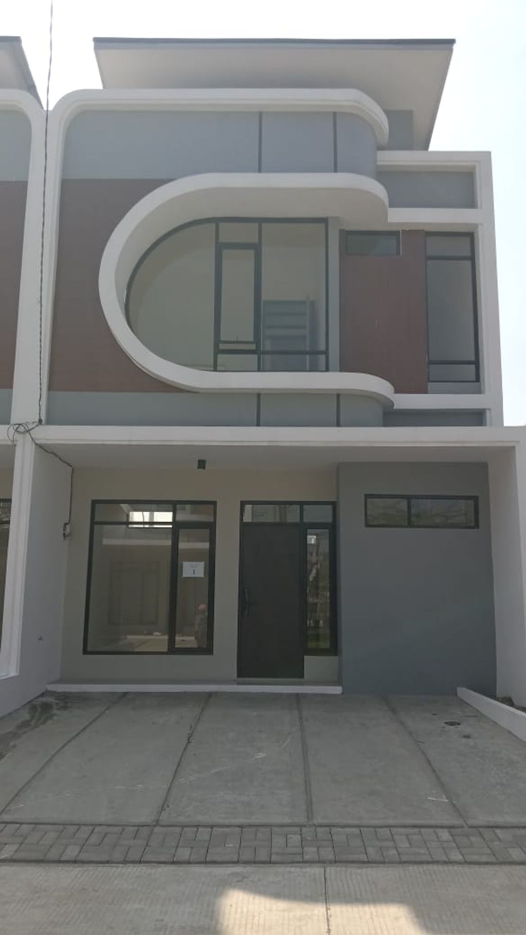 foto tampak rumah tipe 57 Compact High Ceiling (3KT) (668) perumahan G-Land Ciwastra Park 2