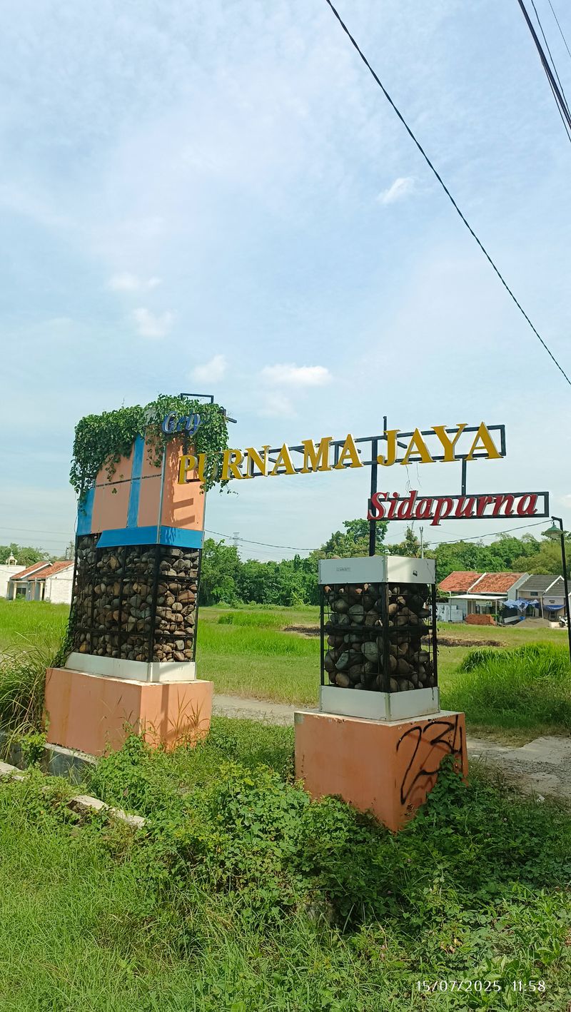 foto gerbang perumahan Perumahan purnajaya