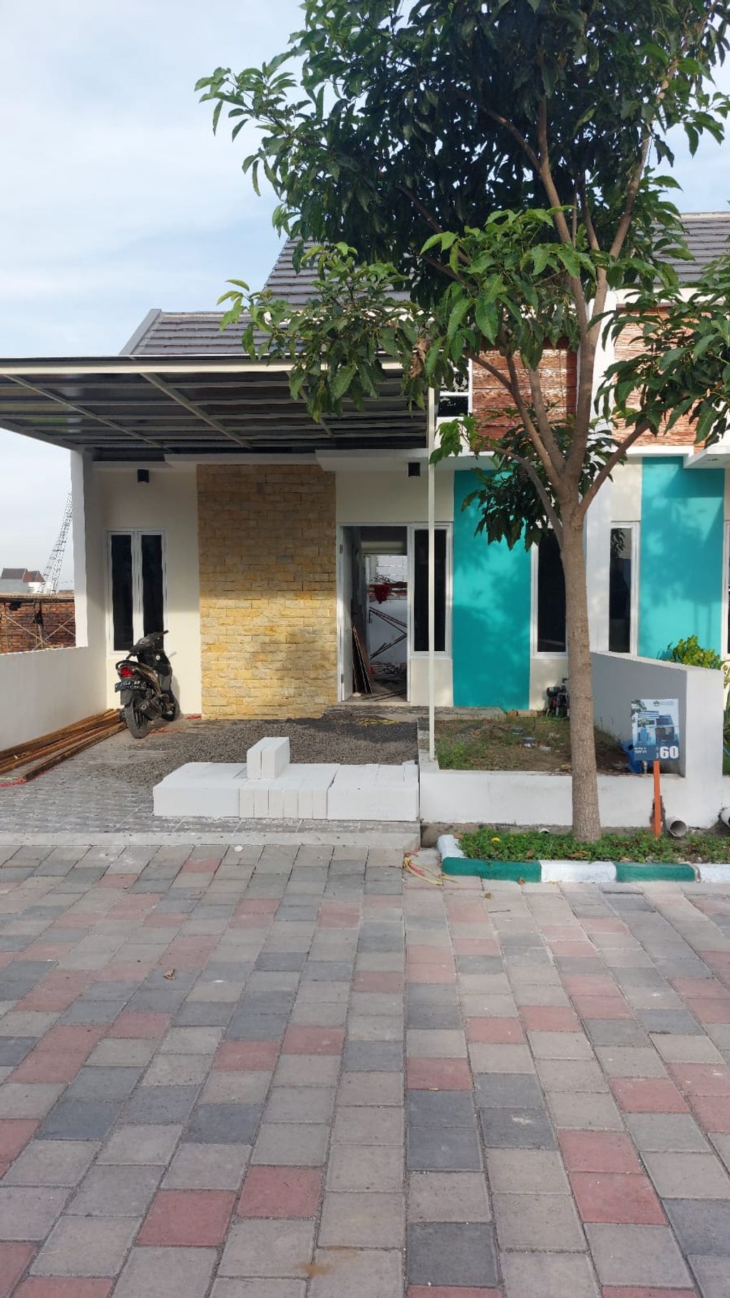 foto tampak rumah tipe T-40 A-60 perumahan GRAHA AMERTA BOULEVARD