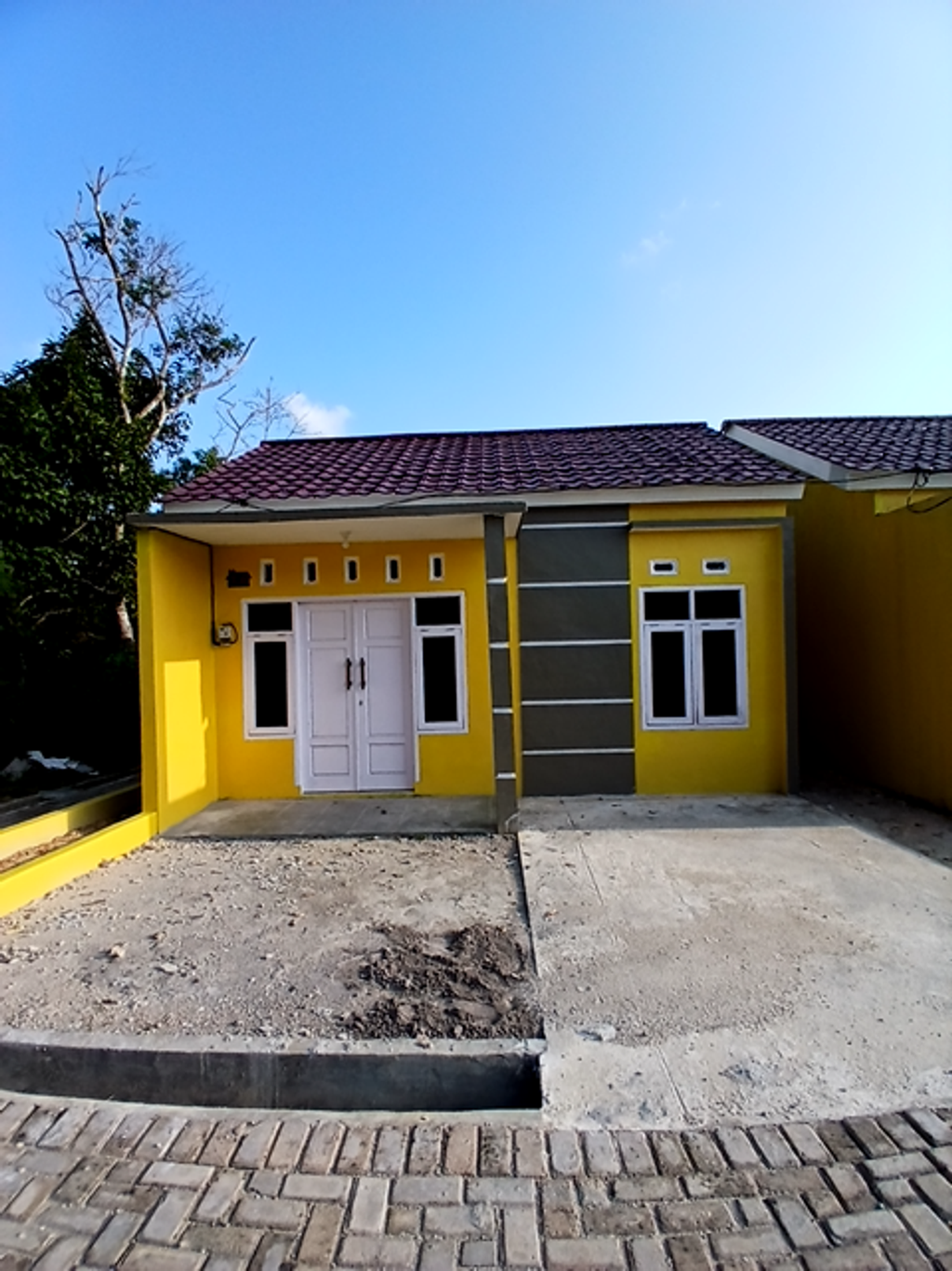 foto tampak rumah tipe 36/91 perumahan anjaya residence