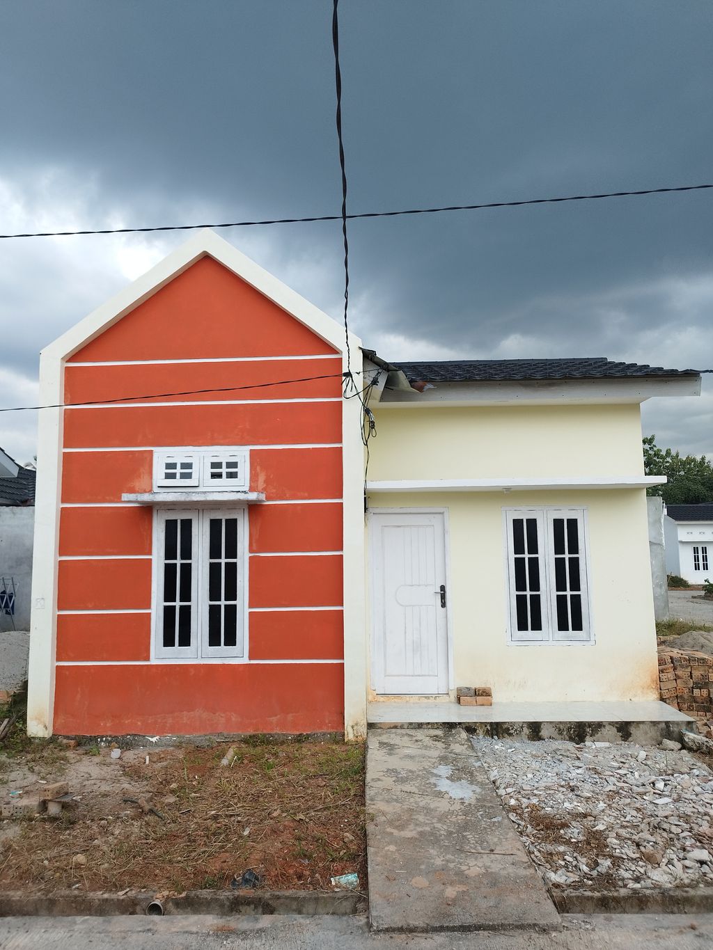 foto contoh rumah perumahan SUNDAY VILLAGE