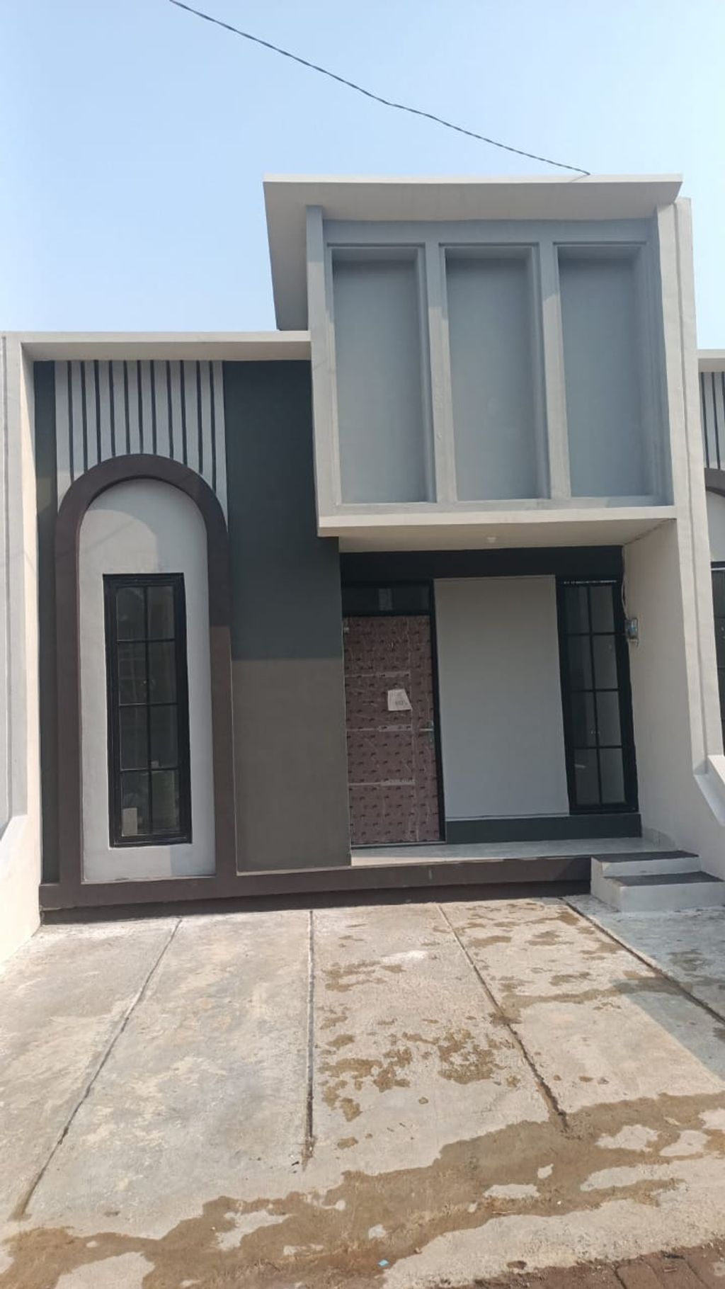 foto tampak rumah tipe 30 1 Lantai Kontur 1m (349) perumahan G-Land Padalarang Valley