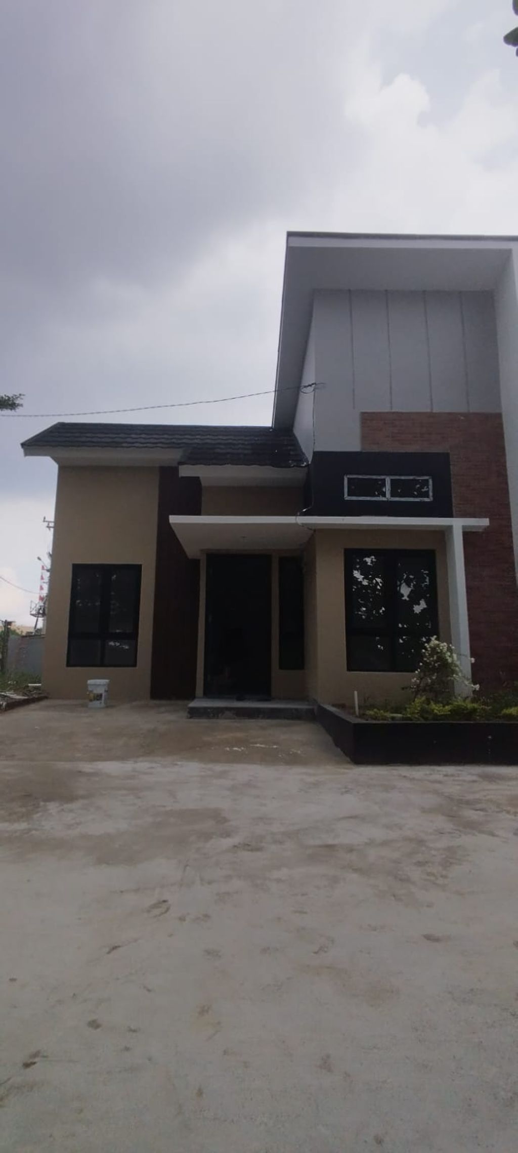 foto tampak rumah tipe Rumah Tinggal 42/82 (2) perumahan Griya Duta Mas Cluster Dandelion