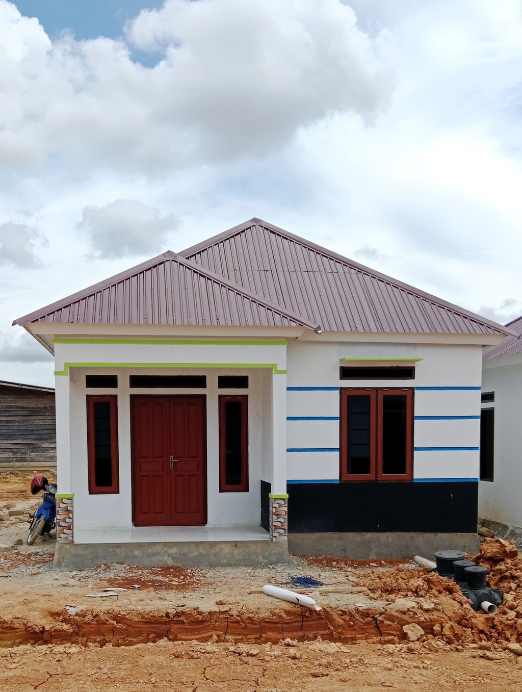 foto tampak rumah tipe 36 perumahan BUMI RAHAYU RESIDENCE 2