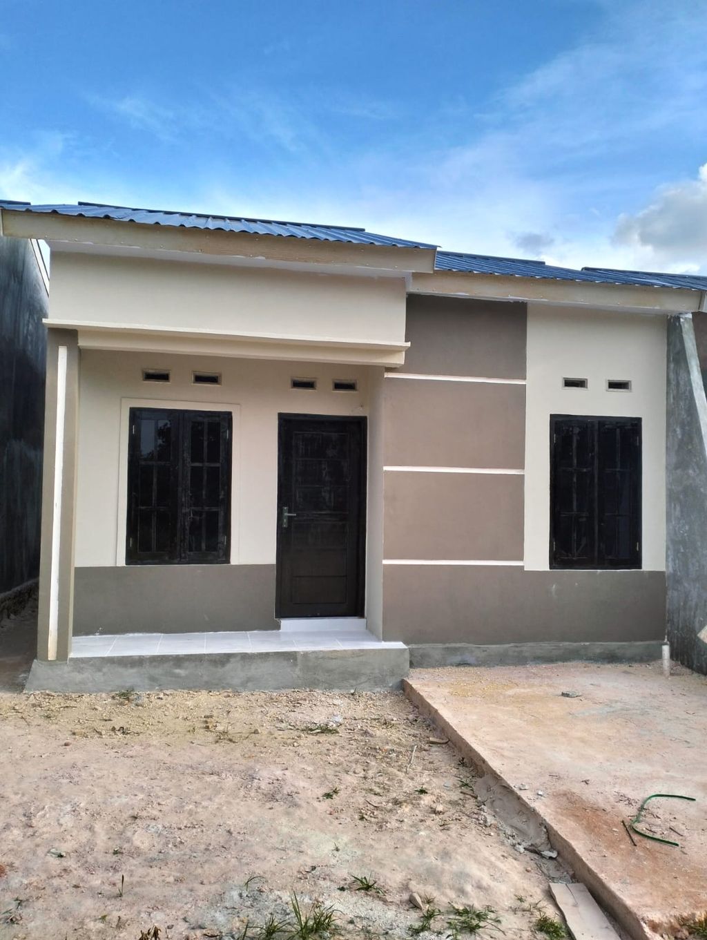 foto tampak rumah tipe 36 perumahan ALAM KEMUNING RESIDENCE
