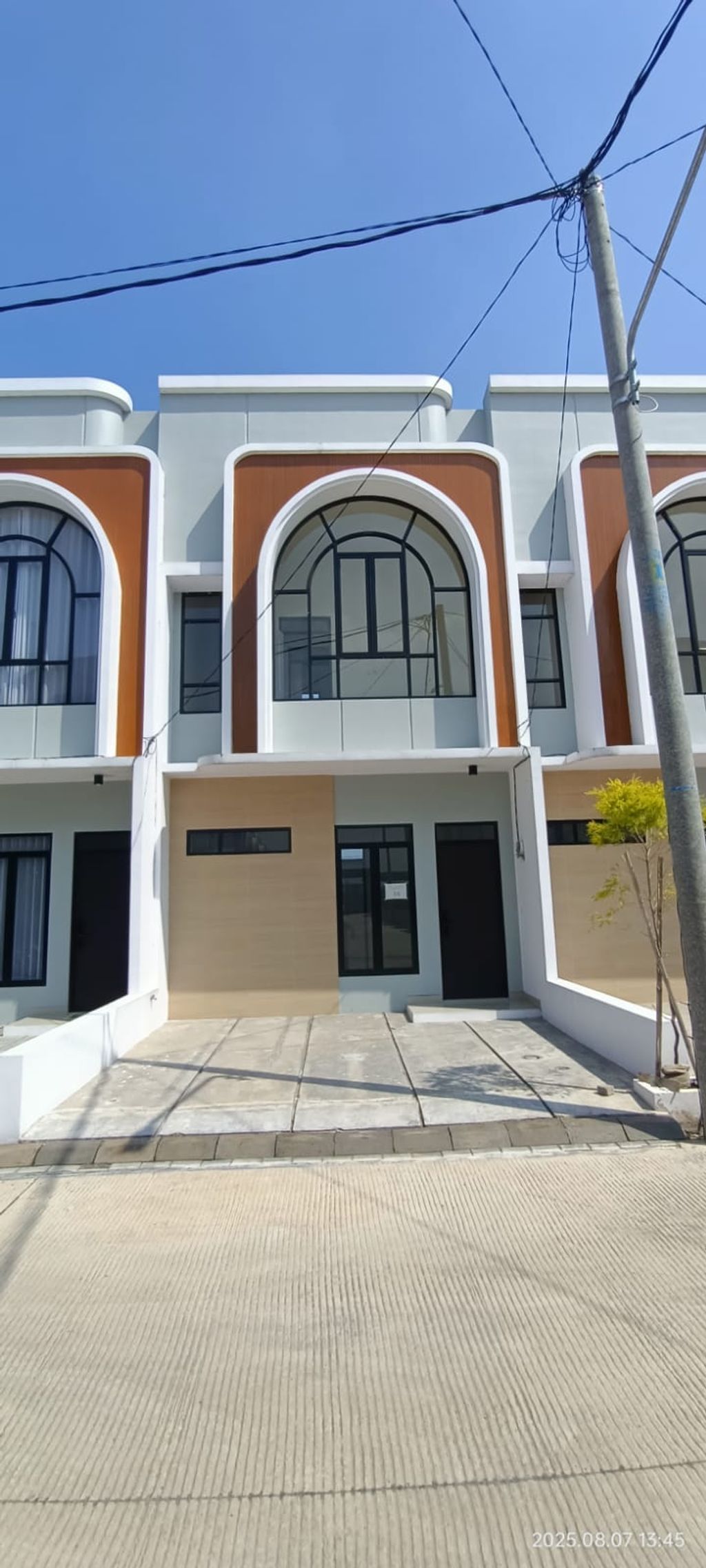 foto tampak rumah tipe 50 Compact 3 Kamar HC (556) perumahan G-Land Ciwastra Park 2