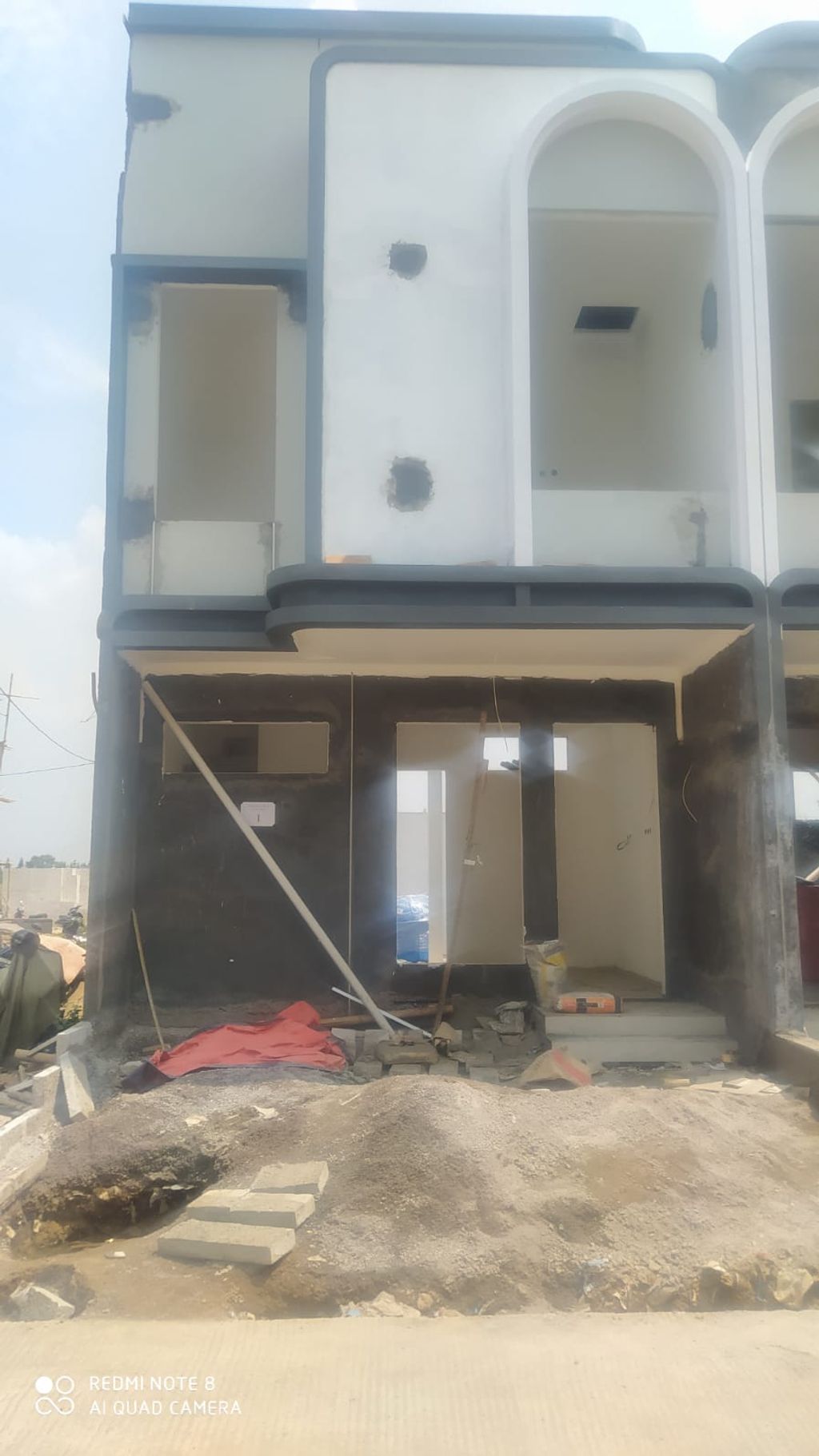 foto tampak rumah tipe 38 Compact 2 Kamar HC (473) perumahan G-Land Ciwastra Park 2