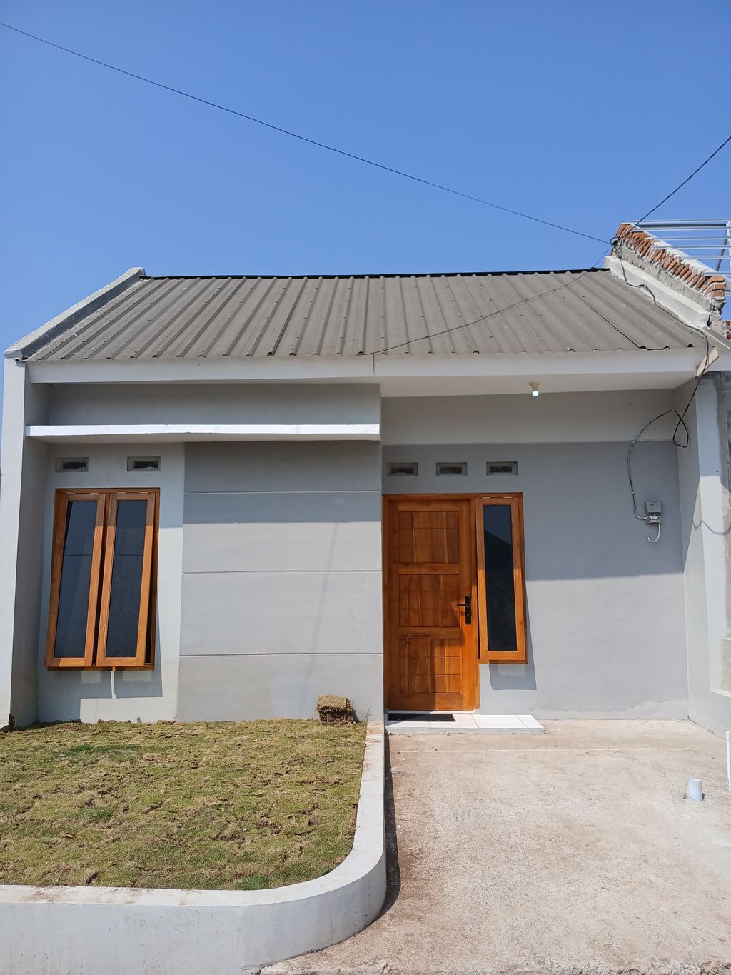 foto tampak rumah tipe TLR perumahan THE LEAF PLATINUM 2