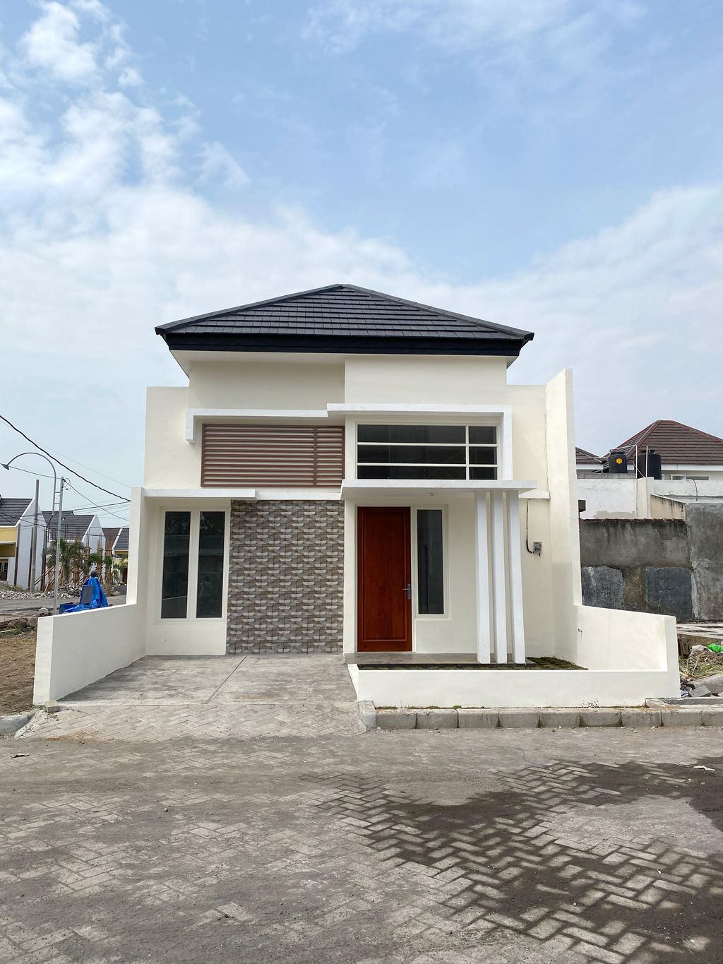 foto tampak rumah tipe 40/112 perumahan PALM VILLE REGENCY
