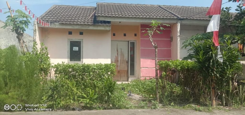 foto tampak rumah tipe 25 x 115 perumahan GRIYA JUNTI ASRI