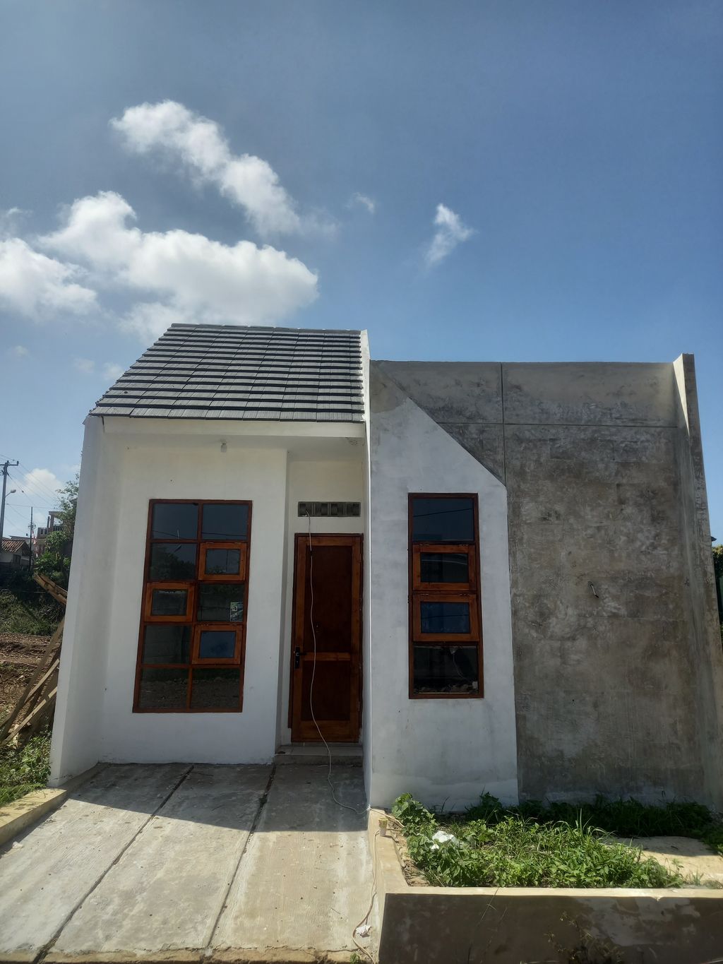 foto contoh rumah perumahan Restoe Boemi X HWD