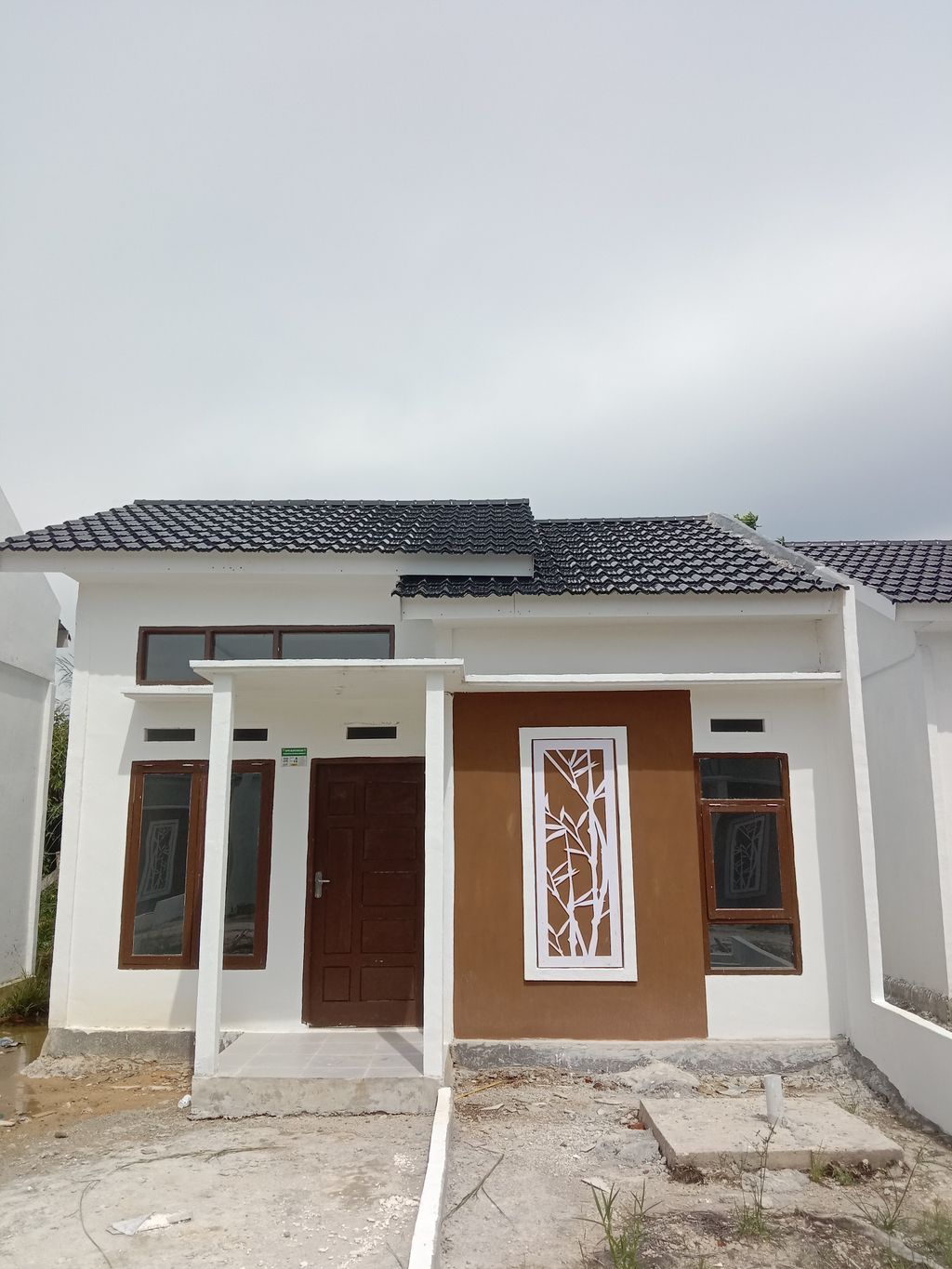 foto tampak rumah tipe 36/93,5 perumahan GRAND ROKAN DURI