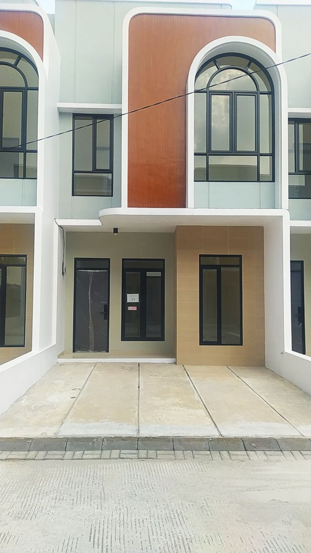 foto tampak rumah tipe 43 Compact 3 Kamar HC (485) perumahan G-Land Ciwastra Park 2
