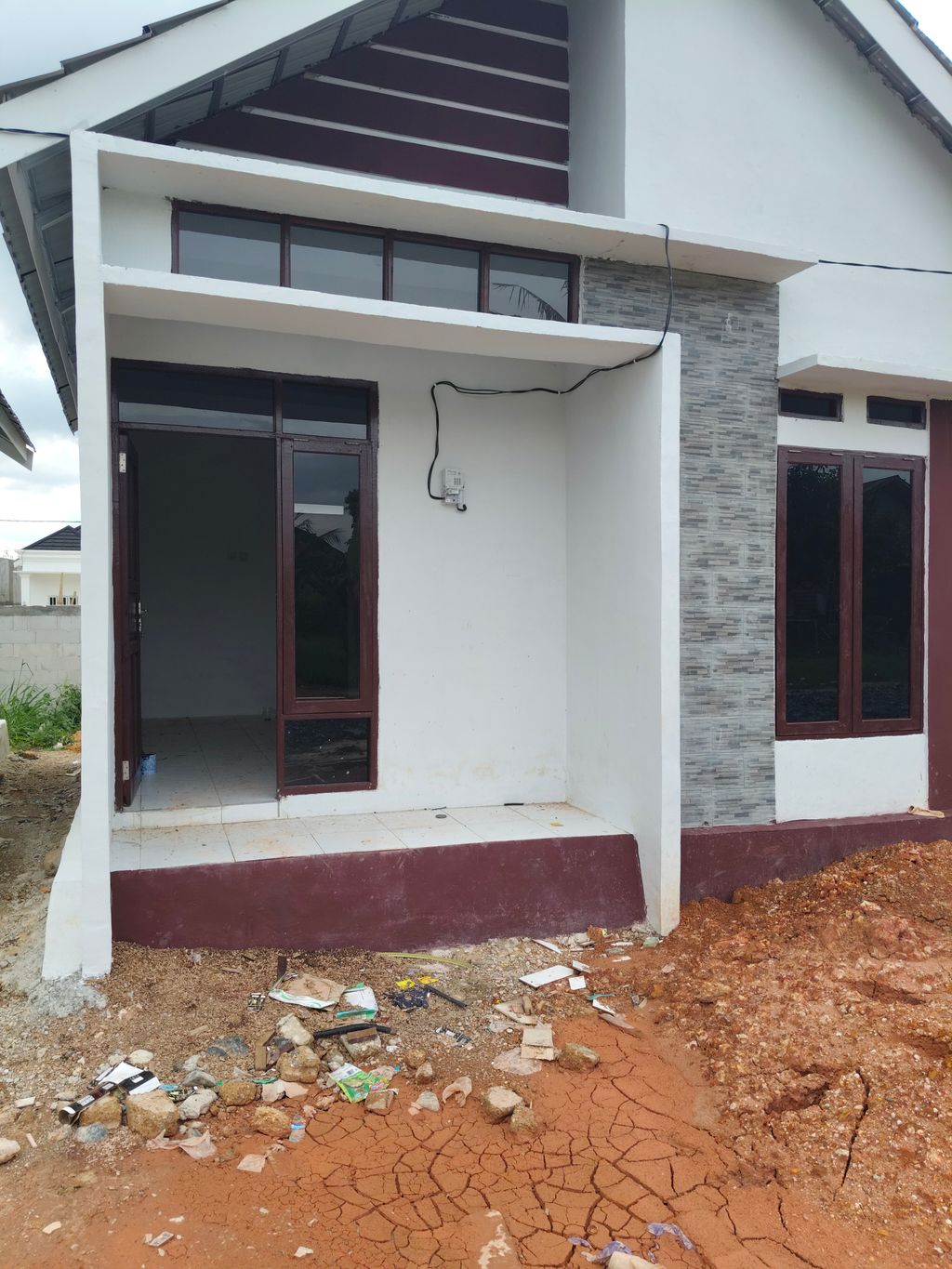 foto tampak rumah tipe ARWANA SEKUMPUL RESIDENCE 3 perumahan ARWANA SEKUMPUL RESIDENCE 3