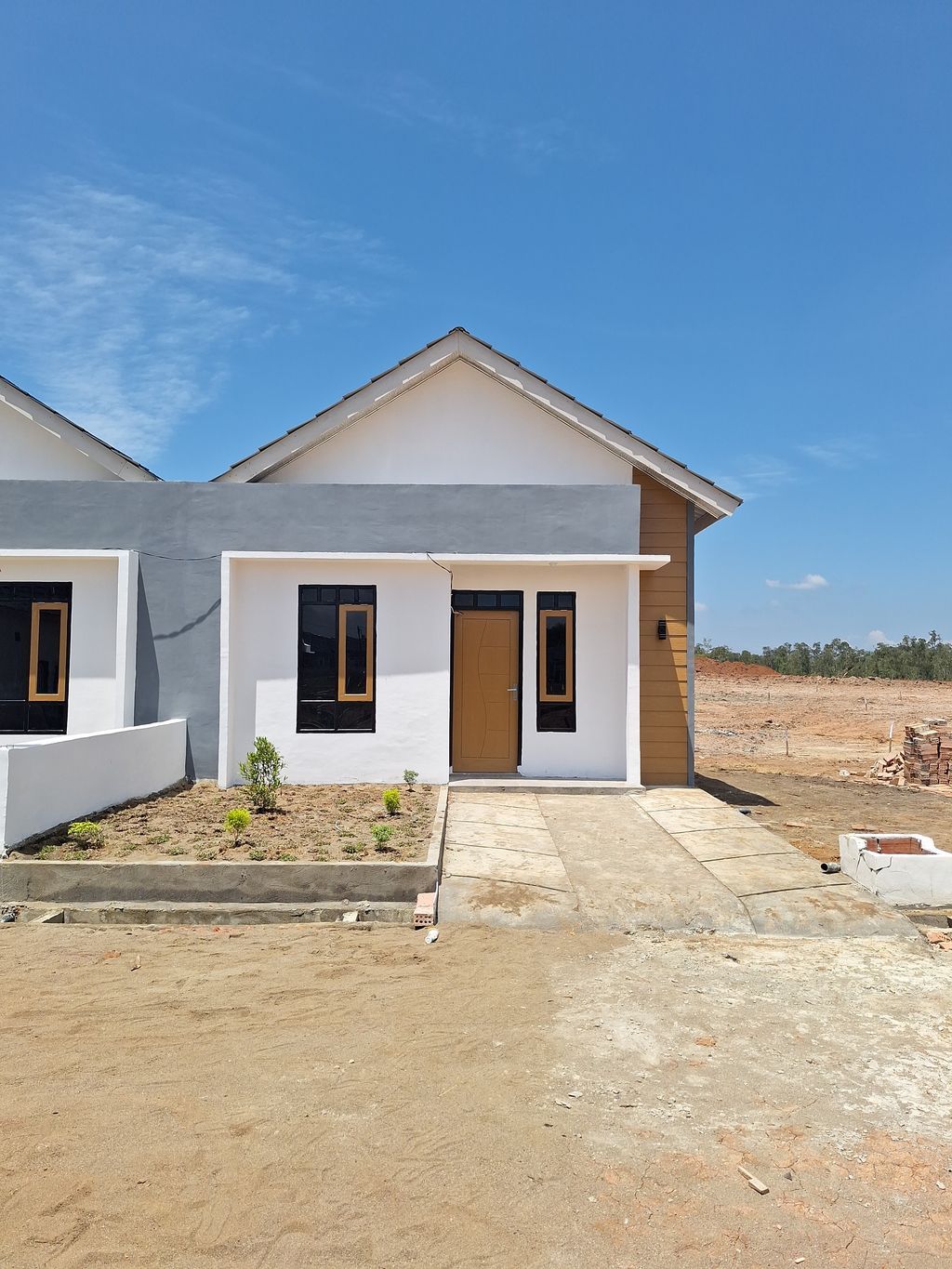 foto tampak rumah tipe 36 (39 UNIT) perumahan GRAND KENCANA UTAMA CLUSTER BALI I