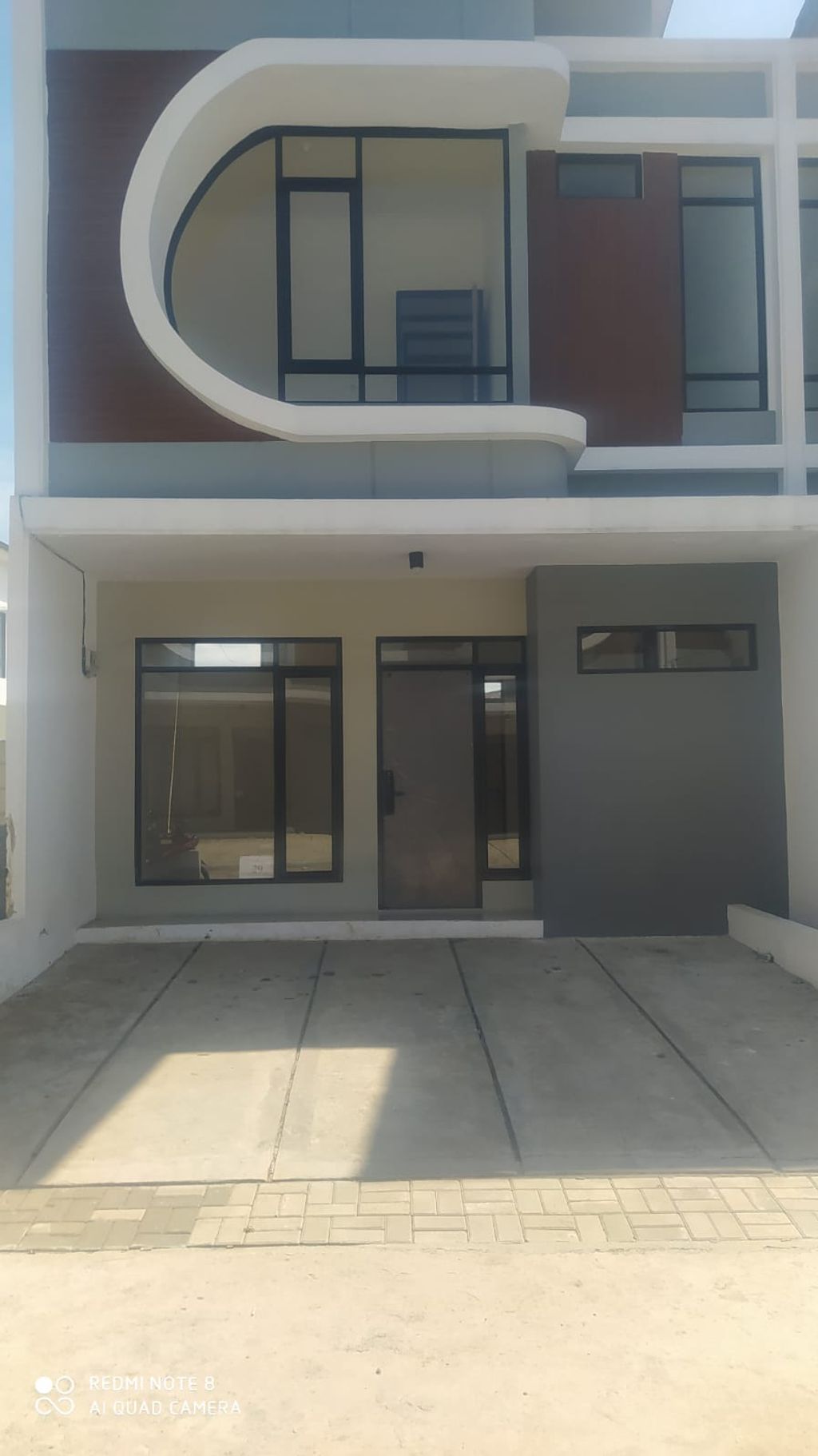 foto tampak rumah tipe 57 Compact High Ceiling (3KT) (668) perumahan G-Land Ciwastra Park 2