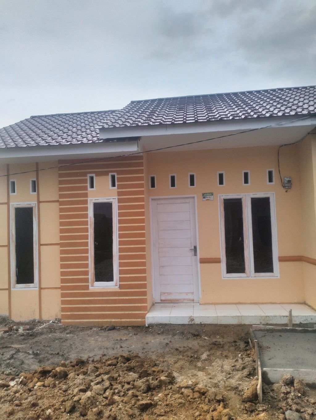 foto tampak rumah tipe 36/87 perumahan PURI ANOM MINIMALIS II